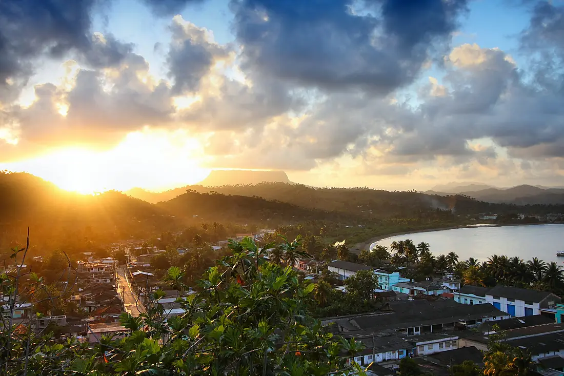 008 Baracoa town sunset in Cuba, El Yunque table mountain in background