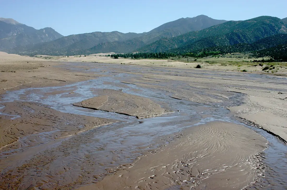 Intermittent Medano Creek Seeps through Desert Sands