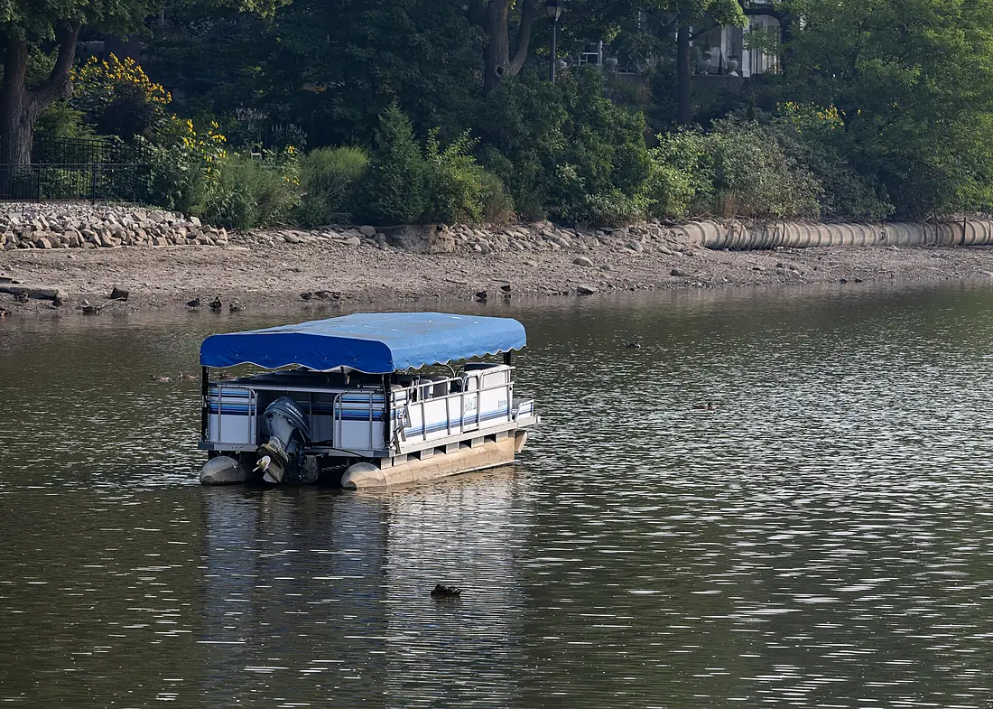 Cruise boat with collapsed awning on Avon River, Stratford, Ontario, 2025-08-04