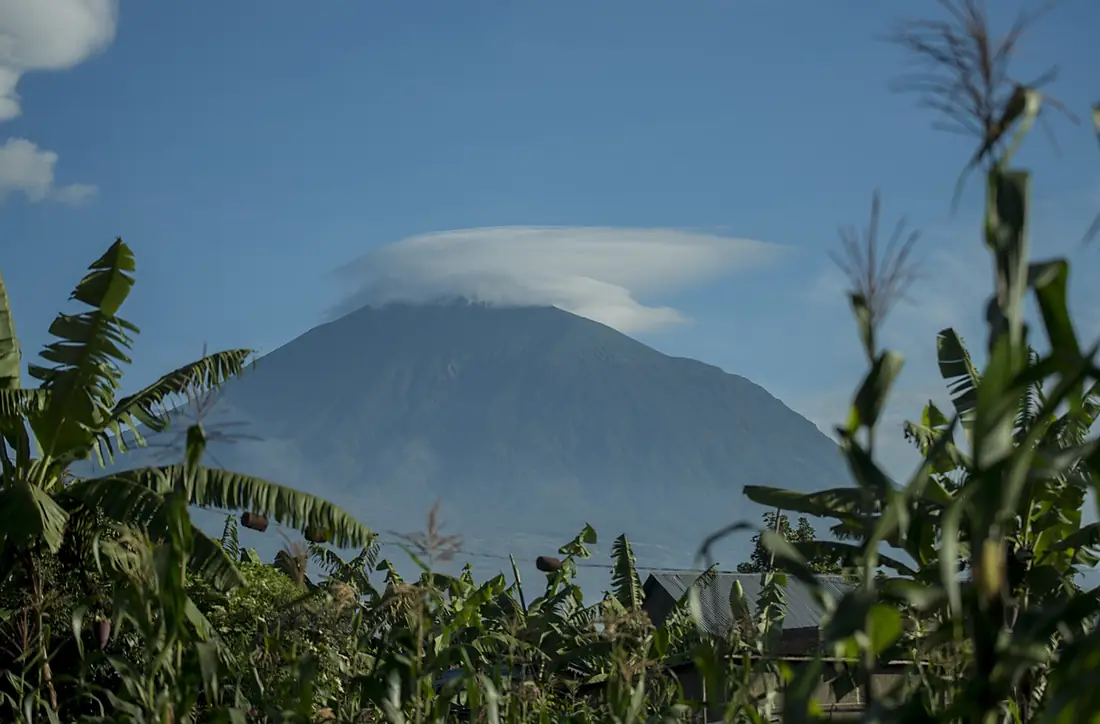 View of Muhabura Volcanoe in Kinigi sector, Musanze district, Rwanda afar from Volcanoes Park