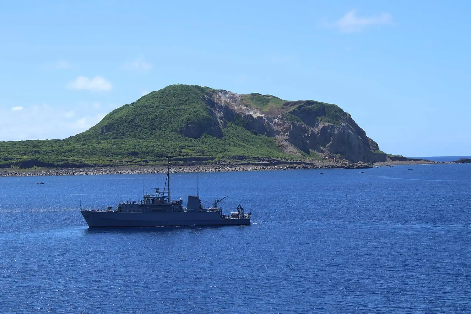 Mt. Suribachi on Iwo Jima Island and JS Ukushima(MSC-686)