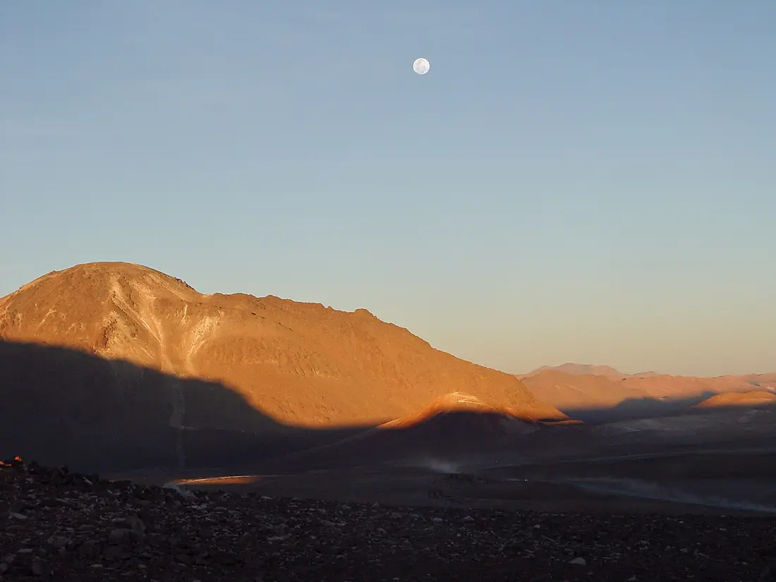 The moon high above Cerro Chajnantor at sunset